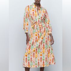 Button Down Dress With Belt Spring A-line Midi Dress With Button Closure, Multicolor Button-up Shirt Dress For Spring, Collared Vacation Dress With Buttons, Multicolor Shirt Dress With Button Closure For Spring, Collared Button Dress For Vacation, Collared Dress With Buttons For Vacation, White A-line Maxi Dress With Buttons, Maxi Length Button Dresses For Garden Party, Maxi Length Dresses With Buttons For Garden Party