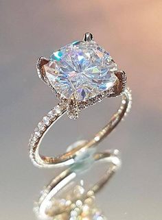 an engagement ring with a diamond in the center