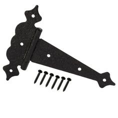 a pair of black iron brackets with screws