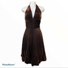 In good used condition. Small rip at halter hem. Please see pictures. 100% polyester Made in USA 🇺🇸 Marilyn style dress Brown Pleated Party Dress, Brown Pleated Evening Dress, Brown Fitted Pleated Dress, Fitted Brown Pleated Midi Dress, Brown Stretch Dress For Formal Occasions, Formal Brown Stretch Dress, Cache Dress, Dresses Vintage, Google Shopping