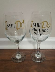 two wine glasses that say still do and what she says are on the bottom one