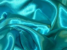 PRICES MAY VARY. FABRIC : Turquoise Silky Plain Japan Satin Fabric SIZE : Package Of 3.5 Metre Width 43 Inches - 109 cm DESIGN FOR SEWING : THE DESIGN CART fabrics Perfect for cutting into shapes, making costumes, decorations; easy to iron and safe for kids,good for many craft projects and sewing diy craft MULTIFUNCTION : Suitable for arts and crafts, DIY, sewing, scrapbooking, dolls clothes, wallet, sewing toys, tildas, patchwork, quilting and other sewing projects, PICTURE : We try our best to Curtain Lining Fabric, Draping Fabric, Liquid Satin, Turquoise Fabric, Calico Fabric, Tulle Fabric, Satin Material, Polyester Satin, Lining Fabric