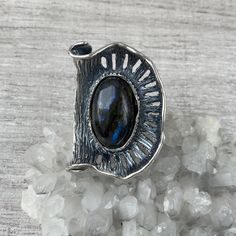 Large Labradorite ring sterling silver, abstract ring women, unusual ring, Handmade ring, Natural labradorite stone ring,  made in Armenia Natural labradorite ring in high-quality sterling silver.  Perfect for women who love designer jewelry! 【FULL DETAILS】 ► Gemstone: natural labradorite ► RING  SIZE:  all sizes are available (choose from the option) ► RING WEIGHT:  approx. 28 gr ⦿ Attention: The color of the stones may differ due to a difference between monitors All our jewelry is crafted with great attention to detail! We strive to provide you the best quality, modern design, and perfect look!! All our jewelry is made of high-quality sterling silver and is stamped with a 925 stamp This is a natural stone and it is unique, so it might not be possible to make the second one with exactly t Unique Sterling Silver Moonstone Ring, Unique Hand Forged Moonstone Ring Gift, Unique Hand Forged Moonstone Open Ring, Unique Hand Forged Open Moonstone Ring, Unique Handmade Freeform Ring, Sterling Silver Freeform Rings As Gifts, Modern Handmade Moonstone Ring For Gift, Unique Oval Moonstone Ring, Unique Silver Labradorite Ring