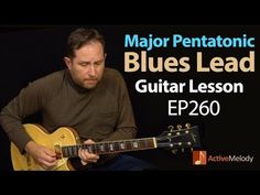 a man playing guitar with the words major pentatonic blues lead guitar lesson ep200