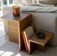 The Ojai Valley Side Table in Walnut is designed to create interest in the eye of the viewer. With its tiered levels, geometric build, sleek structure, and built-in magazine rack, the piece delivers at every angle.  Our Valley Side Tables are made of walnut veneer. The reason we opt for veneer for this piece is to achieve a thinness in design that would not be possible using solid wood, as solid wood would bend and warp when exposed to changes in Wood Furniture Design Living Room, Side Table Oak, Simple Wood Decor, Modern Wood Side Table, Wood Side Table Living Room, Bed End Table, Side Table Ideas, Simple Side Table, Simple Furniture Design