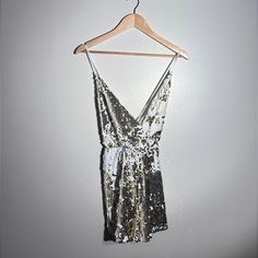 New With Tags, Gold And White Sequin Romper Jumpsuit, Perfect For The Holidays Or New Year’s Eve. One Side Of The Sequin Is Gold, Other Side Is White So The Look Changes As They Move Around. Brand: L’atiste By Amy Size: M Color: Gold & White Hand Measurements: Waist Across Not Stretched: 14” Length From Waist To Hem: 14” Sequin Rompers, Hand Measurements, Flare Jumpsuit, Wrap Romper, Strapless Romper, Romper Jumpsuit, White Romper, Red Jumpsuit, Striped Jumpsuit