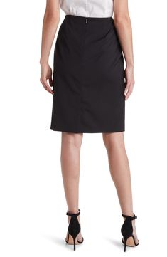 Bring modern style to your work-to-weekend wardrobe with this pencil skirt crafted from pure virgin wool. 23" center front length (size 8)   Lined   100% virgin wool   Dry clean   Imported   Hugo Boss/BOSS/HUGO has received the Fair Labor Association accreditation, which signifies that the company has effective systems and procedures in place to successfully uphold fair labor standards throughout its supply chains, including strategies and tools to address and improve working conditions Black Elastane Pencil Skirt For Work, Tailored Knee-length Skirt For Work, Modern Knee-length Pencil Skirt For Formal Occasions, Office Wool Skirt In Black, Classic Knee-length Elastane Pencil Skirt, Black Elastane Pencil Skirt For Formal Occasions, Formal Relaxed Fit Knee-length Pencil Skirt, Elegant Elastane Pencil Skirt For Office, Relaxed Fit Knee-length Pencil Skirt For Formal Occasions