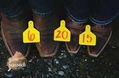 three pairs of brown shoes with yellow tags in front of them that read, best pamsoe