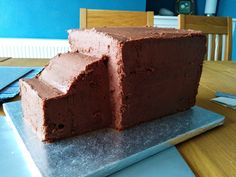 a chocolate cake sitting on top of a table