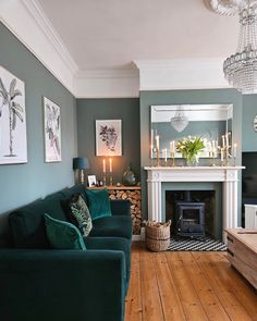 a living room filled with furniture and a fire place