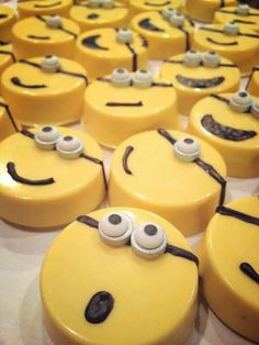 some yellow and black decorated cakes with eyes