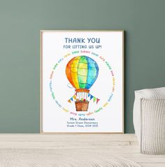 a colorful hot air balloon with the words thank you for lifting us up