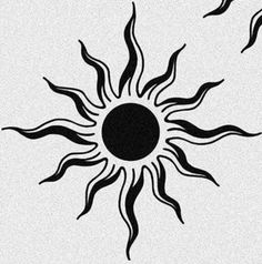 a black and white drawing of a sun