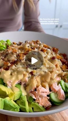 Nicole Keshishian | KALEJUNKIE® on Instagram: "@kalejunkie #1 most loved recipe of 2024 with 30 million views across platforms is my CRISPY RICE SALMON SALAD WITH CREAMY HONEY GINGER DRESSING and it is absolutely delicious; so if you haven’t made it yet, consider this your sign!⁣
⁣
If you like recipes like this, be sure to FOLLOW my page for more in 2025🎉! ⁣
⁣
Makes 4 large servings or 6 smaller⁣
Crispy Rice⁣
2 cups cooked rice, cooled (I used jasmine rice)⁣
2 tsp soy sauce⁣
2 tb chili crisp/crunch (Trader Joe’s makes a good one, I used Momofuku this time!)⁣
1 tb sesame oil⁣
⁣
Salmon⁣
8oz salmon⁣
Pinch garlic powder, salt & pepper⁣
⁣
Salad⁣
5 Persian cucumbers, thinly sliced (or 1 large English cucumber)⁣
1 cup edamame, shelled⁣
1 bunch green onions, thinly sliced (3/4 cup)⁣
1 avocado, di