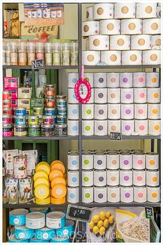 an assortment of food items displayed on shelves in a grocery store, including eggs, cereals and other foodstuffs