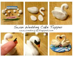 swan wedding cake topper made out of fondant icing and marshmallows