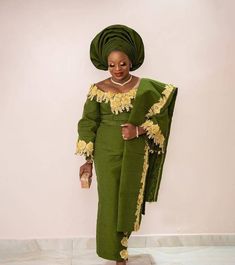 This beautiful attire is made from pure cotton Asooke from the western part of Nigeria, mostly worn to traditional occasions and speak class in all ramification owing to the great sewing techniques and finishing put into it. It is very suitable for a wedding dress and give you that royal and classy look. We can also customize it in any colour of your choice. The female attire consists of 1. wrap Skirt /wrapper 2. Blouse 3. headgear (or Autogele) 4. shoulder shash. The male attire consists of 1.A Elegant Green Traditional Wear For Ceremonies, Elegant Green Agbada For Wedding, Fitted Green Traditional Wear For Ceremony, Gold Fitted Agbada For Wedding, Gold Traditional Agbada For Wedding, Traditional Gold Agbada For Wedding, Dark Green And Burnt Orange, Green And Burnt Orange Wedding, Male Attire