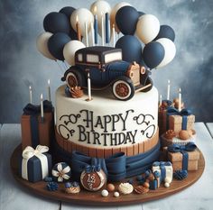 a birthday cake decorated with balloons, gifts and an old fashioned car on a wooden platter