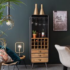 a living room filled with furniture and a wine rack on top of a wooden cabinet