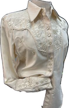 Formal Long Sleeve Blouse With Embroidered Cuffs, Fitted Embroidered Button-up Shirt, Elegant Blouse With Embroidered Cuffs, Formal Fitted Tops With Embroidered Cuffs, Western Style Embroidered Button-up Top, Embroidered Button-up Western Tops, Fitted Long Sleeve Blouse With Embroidered Cuffs, Fitted Formal Shirt With Floral Embroidery, Formal Fitted Shirt With Floral Embroidery