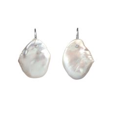 The Sienna Earrings, crafted from exquisite baroque pearls, are available in both silver and gold finishes. Featuring a unique flat shape and vintage style, these earrings offer timeless elegance. Each pair of pearls is uniquely shaped, and we will carefully select the best match for you. Luxury Mother Of Pearl Drop Earrings, Elegant Oval Pearl Earrings With High Luster, Handmade Teardrop Baroque Pearl Earrings, Handmade Baroque Pearl Teardrop Earrings, Luxury Oval Pearl Drop Earrings, Single Baroque Pearl Earring In Pearl White, Pearl White Drop Earrings Made Of Mother Of Pearl, Handmade Baroque Pearl Earrings In Pear Shape, Pearl White Drop Earrings In Mother Of Pearl