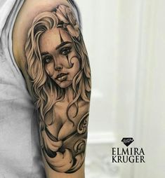 a woman's arm with a tattoo on it