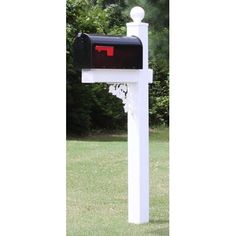 a white mailbox with a red letter on it