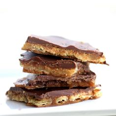 chocolate and peanut butter bars stacked on top of each other