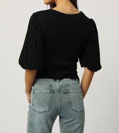 Puffed short sleeve top with a low neckline for a flirty but still classy look. Pair with our Gisele high rise skinny jeans in style black arrow for the ultimate date night outfit. Solid color knit on standard fit. Body length from HPS: 21", Sleeve length: 13, Bust: 32" (Size Small) 95% RAYON 5% SPANDEX Machine wash cold, Gentle cycle inside out Imported Low Neckline, How To Look Classy, Date Night Outfit, Date Night, Short Sleeves Tops, Spandex, Sleeve Length, Solid Color, Black