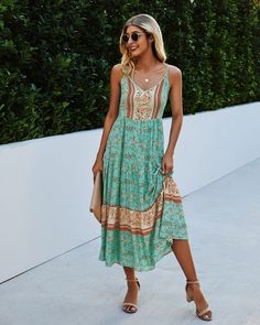 The EMES SHOP dress is detailed with a fun floral print. Features a v neck line. spaghetti straps. A-line silhouette. and maxi ankle length. Pair it with sunnies and a clutch for a gorgeous summer look.MATERIAL:100%Soft Viscose MEASUREMENTS:Dress Length is 48"-50"in Small | Bust: 35"-37"in & Waist: 24"-26"in Medium | Bust: 37"-39"in & Waist: 26"-28"in Large | Bust: 39"-41"in & Waist: 28"-30"in X Large | Bust: 41"-43"in & Waist: 30"-32"in MEASUREMENTS:Dress Length is121"-126"cm Small | Bust: 88"-93"cm& Waist:60"-65"cm Medium | Bust:93"-98"cm & Waist: 65"-70"cm Large | Bust: 98"-103"cm & Waist:75"-80"cm X Large | Bust:103"-108"cm & Waist:80"-85"cm Printed Sundress For Summer Garden Party, Trendy Summer Sundress For Garden Party, Trendy Summer Maxi Dress For Brunch, Trendy Floral Print Sundress For Beach Season, Summer Maxi Dress With Spaghetti Straps For Garden Party, Trendy Floral Print Beach Sundress, Trendy Floral Print Sundress For The Beach, Spring Boho Print Sundress, Printed Maxi Dress For Summer Day Out