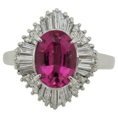 For Sale on 1stDibs - A sweet ring featuring a fine gem tourmaline. It weighs 2.58 carats and has a superb bright and vibrant reddish-pink color that dances in the light. It Gia Certified Luxury Pink Ruby Ring, Luxury Pink Ruby Ring In Platinum, Pink Oval Diamond Ring In Platinum, Gia Certified Oval Pink Ruby Ring, Pink Platinum Ruby Ring, Pink Platinum Gemstone Ring, Pink Platinum Rings With Gemstones, Pink Platinum Ring With Gemstone, Formal Gia Certified Pink Gemstones