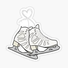 a pair of shoes with hearts hanging from them