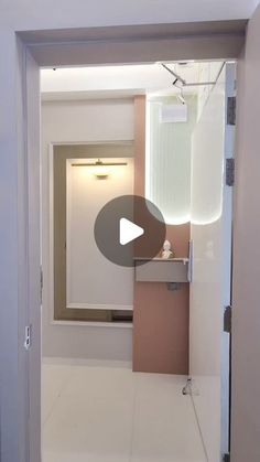 an open door leading into a white bathroom