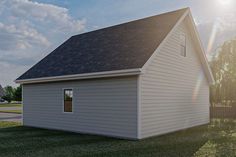 an image of a small house in the grass with sun shining on it's roof