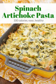 spinach artichoke pasta in a yellow casserole dish with text overlay