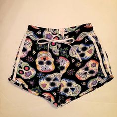 Black Pajamas Shorts With Multi- Colored Skulls On Them. In Brand New Shape Never Been Worn. Size Small. Casual Black Sleepwear For Halloween, Casual Black Pajama Shorts For Sleepover, Black Halloween Shorts, Black Skull Print Bottoms For Summer, Trendy Black Bottoms With Skull Print, Black Casual Shorts For Sleepover, Casual Black Printed Sleepwear, Skull Pajamas, Fuzzy Pajama Pants