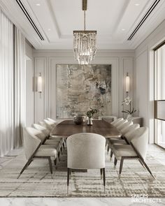 an elegant dining room with chandelier and large painting on the wall behind it