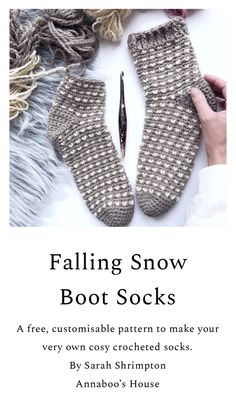 a pair of knitted boots with text that reads falling snow boot socks