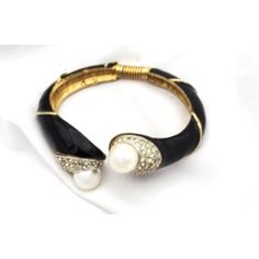 Beautiful vintage Kenneth Jay Lane faux pearl, clear rhinestones, black enamel with gold trim hinged bracelet. This bracelet is so stunning! Elegant Black Bangle For Evening, Elegant Black Evening Bangle, Elegant Black Bangle For Party, Black And Gold Bracelet, Gold Link Bracelet, Gold Link, Hinged Bracelet, Kenneth Jay Lane, Coventry