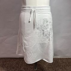 New Without Tags White Drawstring Waist, A-Line, New York City Marathon-Themed Skirt. Silver Metallic Embroidery And Edge Stitching On Raw-Cut Hem 95% Cotton / 5% Spandex Flat Lay Measurements (Inches)... Waist 16 Length 20 Cotton Mini Skirt With Drawstring, Casual Cotton Skirt With Drawstring, White Drawstring Skirt For Spring, Spring White Skirt With Drawstring, Nike Summer Lined Skirt, Nike White Skirt For Spring, Casual Fitted Nike Skirt, Nike Fitted Casual Skirt, Nike White Skirt For Summer