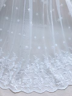 Soft floral embroidery lace fabric by the yard. Perfect for dress making, bridal wear, wedding gown, flower girl dress or curtains. Listing is for ONE YARD. ( Additional quantities are available.) Fabric width approx: 53.1 Inches (135 cm) ..♥ ¸¸..♥ ¸¸..♥ ..♥ ¸¸..♥ ¸¸..♥.. Wholesale acceptable! MORE FABRICS https://www.etsy.com/shop/lacelindsay?section_id=14156869 Feel free to contact me with any questions. To view all our items please click here: .**' http://www.etsy.com/shop/lacelindsay .**' White Embroidered Fabric With Lace Trim For Ceremonies, Ceremony White Dress With Intricate Embroidery, White Embroidered Lace Fabric For Ceremony, Ceremonial White Embroidered Fabric With Lace Work, White Embroidered Tulle Fabric For Ceremonies, White Lace Wedding Dress With Floral Embroidery, White Embroidered Fabric With Delicate Lace For Ceremony, White Floral Embroidered Lace For Summer Wedding, White Floral Embroidery Lace For Summer Weddings