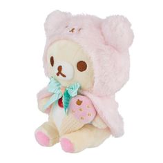 a teddy bear with a pink hat and bow