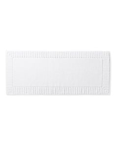 a white bath mat on a white background