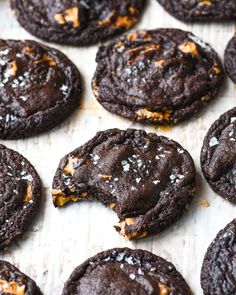 chocolate cookies with orange and white sprinkles