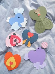 paper cutouts of different shapes and sizes