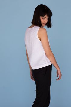 "MsWrinkle's clothing - from human to human. 100% handmade. *Description* - Sleeveless linen top with crew neckline and seam on the front and back; - High quality European linen; - Washed and softened (doesn't shrink anymore); - Medium weight linen (150 g/m2); - Our linen is OEKO-TEX certified that meets human ecological safety requirements; - Model is wearing size S in lavender violet, snow white, berry red, dusty pink, royal blue and elephant grey color (other sizes and colors please choose on Fitted Linen Tank Top For Spring, Spring Crew Neck Vest Top, Fitted Crew Neck Tank Top For Summer, Summer Linen Fitted Tank Top, Fitted Linen Summer Tank Top, Fitted Tank Tops For Summer, Summer Camisole Tank Top, Fitted Sleeveless Top For Summer, Fitted Vest Top For Summer