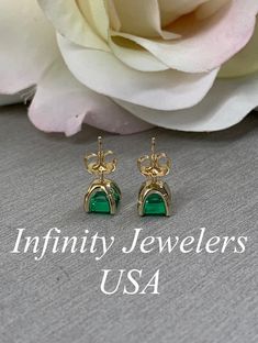 "These earrings are asscher cut lab created green emerald studs, 14k yellow gold #6150 -Approximate total carat weight: 2.00ctw diamond equivalent -Center Stone Size: approx. 1.00ct each diamond equivalent -Gem Type: lab created emerald -Stone Shape: asscher cut 6x6mm -Stone Clarity: VS2 -Stone Color: Green -Metal Type and Purity: 14k yellow gold -Setting: open u setting -Backing: friction back (earring backs are subject to change due to availability) -Country of Manufacturing: USA (Michigan) Fo Pierced Earrings For Anniversary With May Birthstone, May Birthstone Pierced Earrings For Anniversary, Anniversary Earrings With May Birthstone For Pierced Ears, May Birthstone Earrings For Anniversary, Anniversary Earrings With May Birthstone, High-quality 14k Gold Earrings For Anniversary, Gia Certified Gold Earrings For Gift, Gia Certified Yellow Gold Earrings For Gift, Pierced Jewelry For Anniversary Featuring May Birthstone