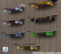 several skateboards mounted to the side of a wooden wall with green wheels and yellow rims