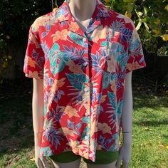 This is a vintage 90s LIZGOLF by Liz Claiborne Hawaiian shirt I love that it's the perfect Hawaiian shirt, bright in color and had monstera leaves on it Perfection 👏🏼 Tag size is a medium (think women's medium though) I'm pretty sure this was made/sold for women but I feel like it's totally unisex  It is 100% rayon, lightweight soft and comfy! I haven't noticed any flaws  This will make such a lovely shirt for someone. If keep it if it were my size! Measurements as follows: Pit to pit laying f Tropical Red Top For Spring, Spring Tropical Red Top, Red Casual Collared Hawaiian Shirt, Casual Red Collared Hawaiian Shirt, Red Hawaiian Tops For Spring, Hawaiian Collared Tops With Relaxed Fit, Relaxed Fit Hawaiian Collared Top, Hawaiian Collared Relaxed Fit Tops, Relaxed Fit Collared Hawaiian Top