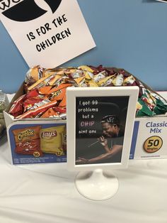 there is a sign on the table that says it's for the children and other snacks